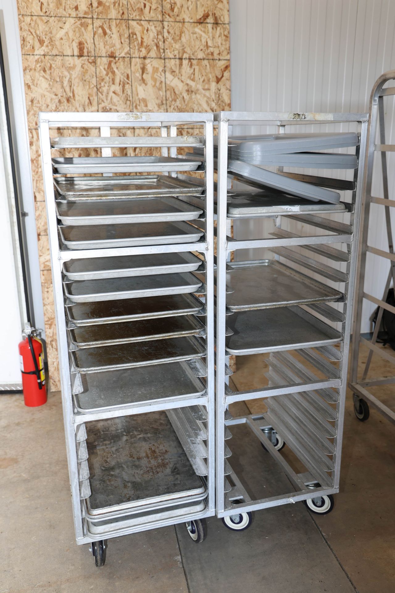 Two speed racks by Newage Industrial, height 63½”, width 20½”, depth 26