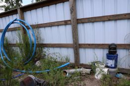 Section of elbow pipe, diameter 7", concrete fittings, miscellaneous liquids, and section of blue ho