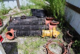 Pipes and fire hydrants pictured