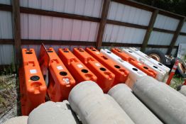 Nine Yodock construction barriers, model 2001MB, and Road Work signs