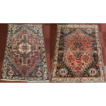 Two Turkmen Baluchi design hand knotted tribal rugs, featuring central medallions with geometric