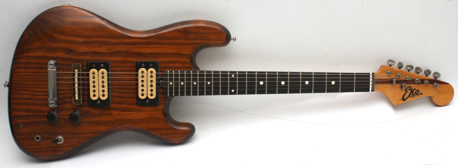 A late 1970s Eko Cobra electric guitar, manufactured in Italy, having double-cut, contoured solid