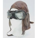 WWII era R.A.F B-Type flying leather helmet, complete with goggles.