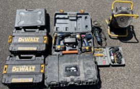 A collection of power tools and cases to include a Ryobi CDI-1802, a Ryobi CDC-181 and others,