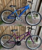 A ladies Raleigh Max Ogre-15 mountain cycle featuring a grip shift gear system together with a