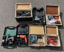 A selection of power tools to include, a Bosch PSR18 18v battery drill, a Black and Decker Type 2