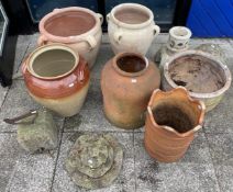 A collection of garden planters and ornaments to include, two terracotta amphora planters, largest