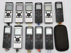 A collection of Olympus digital voice recorders. To include model no. VN-541PC and WS-852.