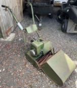 An ATCO cylinder lawn mower.