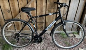 An Apollo Code gents mountain bicycle with Shimano gear system, 21" frame and gel seat cover
