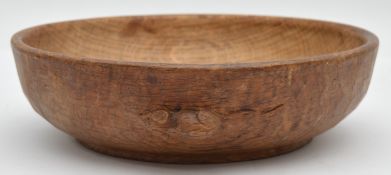 Robert 'Mouseman' Thompson of Kilburn, a mid 20th century adzed oak circular bowl with carved