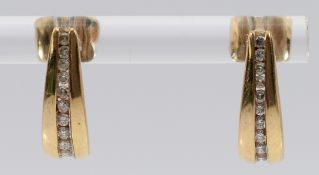A pair of 9ct gold brilliant cut diamond drop earrings with scroll backs, 13mm, 2.3g