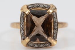 A QVC 9ct gold smokey quartz and single cut diamond dress ring, Birmingham 2007, Q, 3.6g