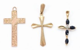 Three 9ct gold cross pendants, 3.8g