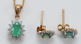 A pair of 9ct gold emerald and diamond cluster earrings with scroll backs, with a matching