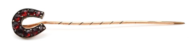 An unmarked Victorian gold garnet stick pin, 1.2g
