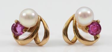 A pair of 9ct gold cultured pearl and pink sapphire earrings with scroll backs, 1.6g