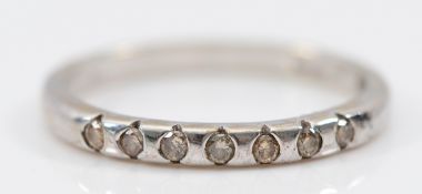 A 9ct white gold brilliant cut diamond half eternity ring, Birmingham 2002, M, 1.8g