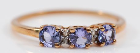 A 9ct gold single cut diamond and iolite dress ring, Birmingham 2011, S, 1.5g
