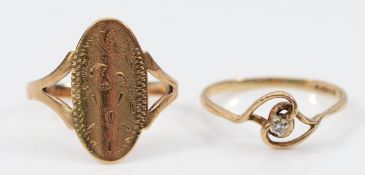 A 9ct gold single cut diamond solitaire ring, Sheffield 1980, K 1/2, with a 9ct gold dress ring,