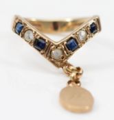 A 9ct gold sapphire and white gemstone wishbone ring with charm, Sheffield 1994, L, 4.3g