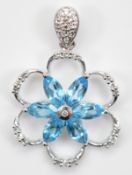 A 9ct white gold brilliant cut diamond and blue topaz floral pendant, 20mm, 2.4g