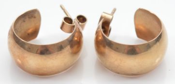 A pair of 9ct gold half hoop earrings with scroll backs, 17mm, 3g