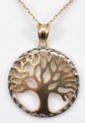 A 9ct gold tree pendant on a 9ct gold chain, 2.2g