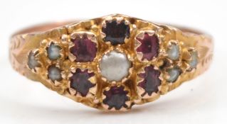 A 9ct gold garnet and seed pearl dress ring, Chester 1912, Hallmarks are worn, Q, 2g