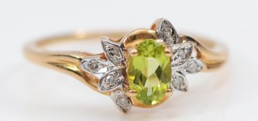 A 9ct gold peridot and single cut diamond dress ring, M 1/2, 1.6g