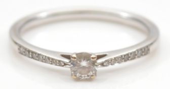 An 18ct white gold brilliant cut diamond solitaire ring, stated weight 0.15ct, with brilliant cut