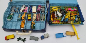 A collection of playworn diecast model cars, with two Matchbox carrycases, in one box.