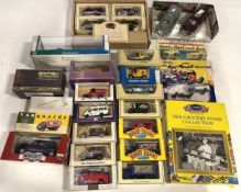 A collection of boxed diecast model vehicles, including Matchbox and Dandy Beano, in one box.