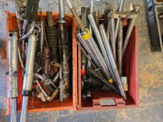 Various forks and shock absorbers, two crates