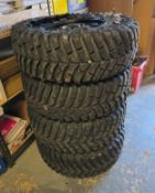 A set of four Land Rover alloy wheels, with Trial 4 X 4 245/70R 16 tyres, one blown.