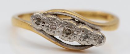An 18ct gold and platinum single cut diamond five stone ring, shank has been cut, L, 2.7g
