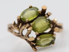 A 9ct gold peridot dress ring, London 1979, P, 3.3g