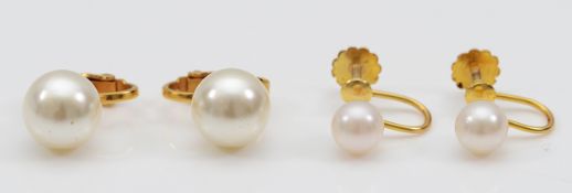 A pair of 9ct gold cultured pearl screw back earrings, 1.7g, with a pair of imitation pearl clip