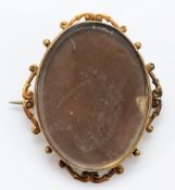 A 9ct gold locket brooch, metal pin, 40mm x 33mm, 6.5g