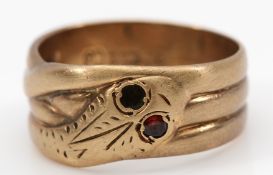 A 9ct gold snake ring, with garnet eyes but one setting is vacant, hallmarks worn, N, 4.3g