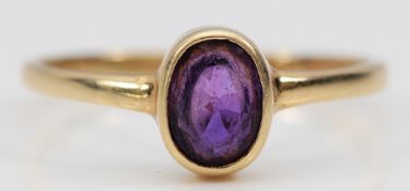 A 9ct gold amethyst solitaire ring, U, 2g