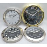 Four Wall clocks in the style of Rolex, Patek Phillipe and Audemars Piguet, for spares and repairs.