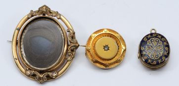 A Victorian mourning brooch, swivels to reveal hair work, 60mm, a Victorian circular gemset