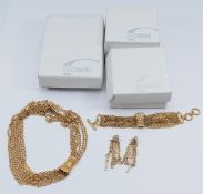 Just Cavalli, a gilt metal multi strand tassel necklace, with matching bracelet and earrings