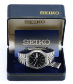 Seiko 5, a stainless steel automatic day date gentleman's wristwatch, black dial with white