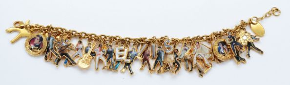 The Bradford Exchange, an Elvis Presley charm bracelet, with 34 charms, 20cm