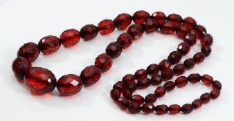A resin beaded necklace, largest bead 28mm, 80cm, 86g