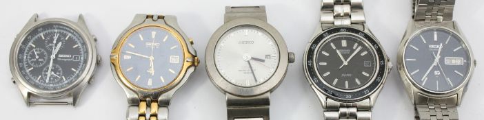 Five, Seiko stainless steel gentleman's wristwatches to include, Seiko quartz, day date, ref. 7123-