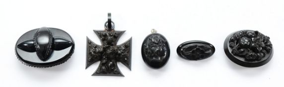 Five pieces of Victorian mourning jewellery, to include brooches and pendants, 77g