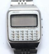 Seiko, a stainless steel quartz calculator wristwatch, having lcd display and calculator